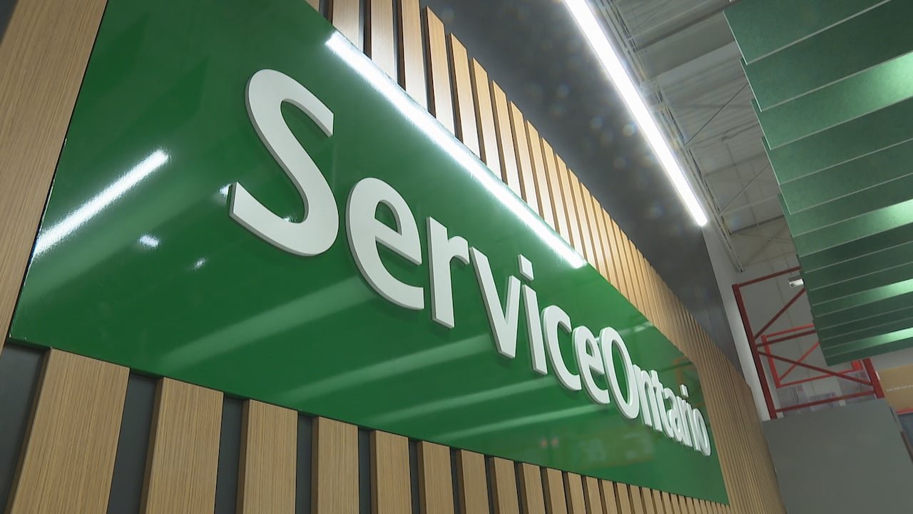 A ServiceOntario sign inside a Staples.